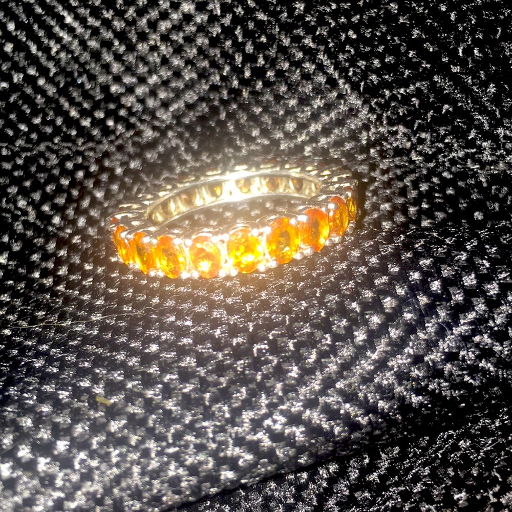 Genuine orange sapphire eternity ring